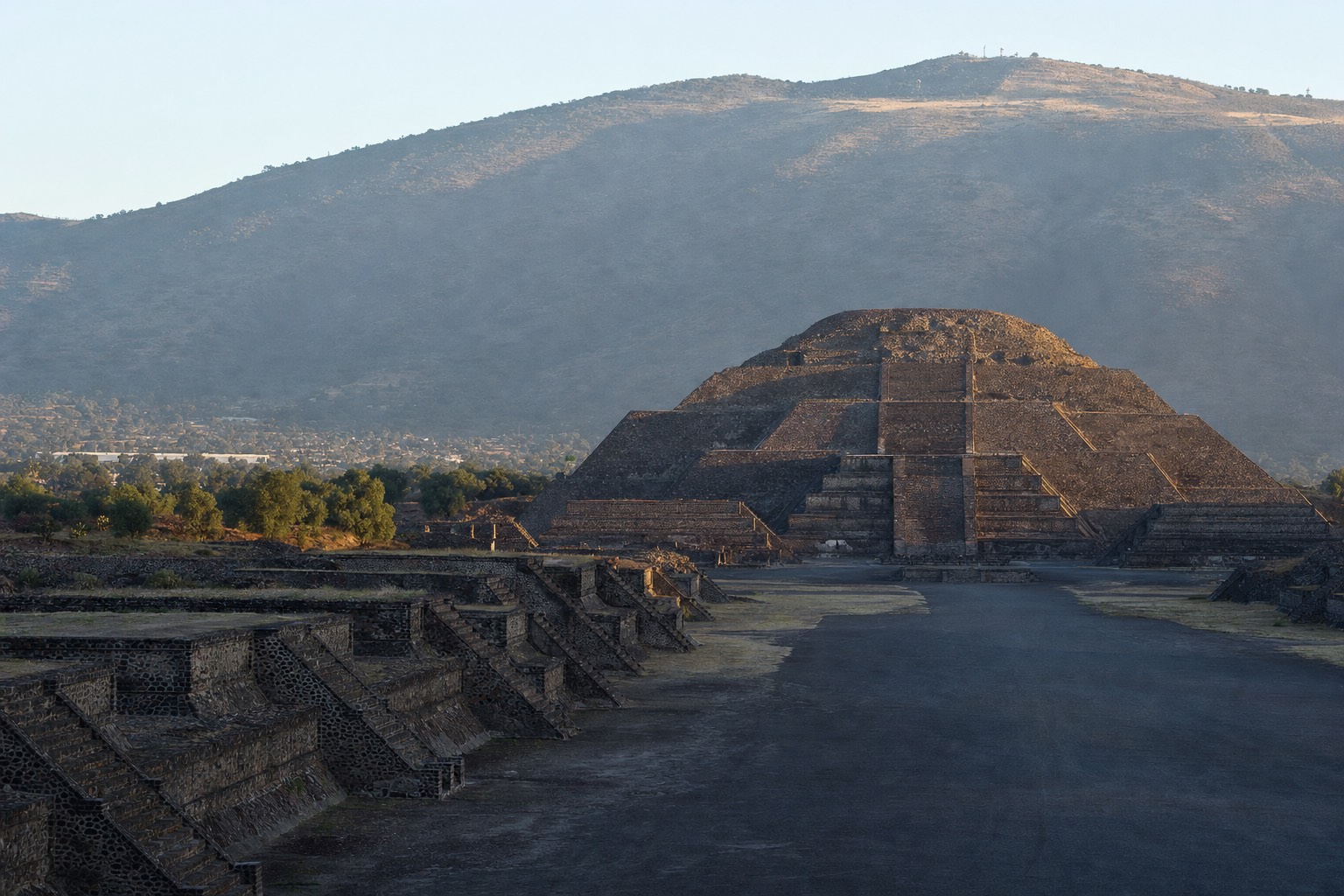 The Pyramid of the Moon at Teotihuacan at sunrise, seen along the Avenue of the Dead