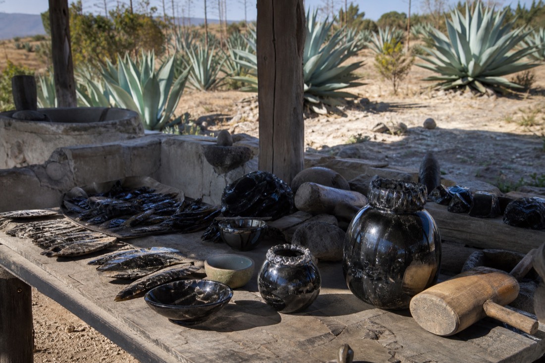 A stone-working demonstration table with obsidian tools near Teotihuacan