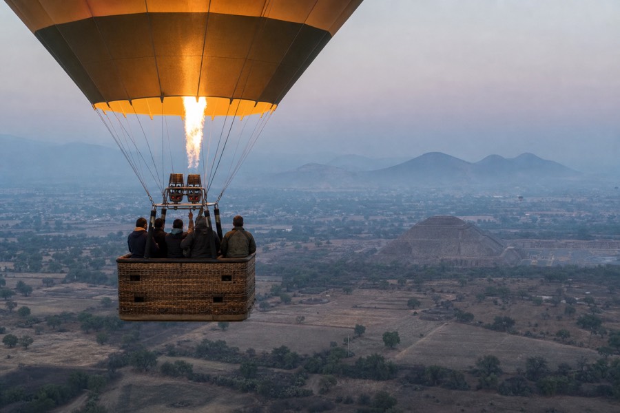 Balloon basket rising above the Teotihuacan valley shortly after a dawn launch